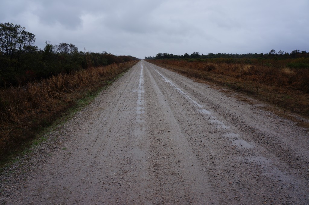 10 slow, difficult miles into the wind on this muddy road nearly finished us.